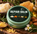 Wild Fern Apothecary Repair Balm in a green tin with its ingredient label visible